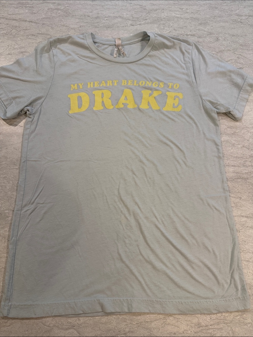 Drake Pale Blue Short Sleeve Tee with Yellow Graphic